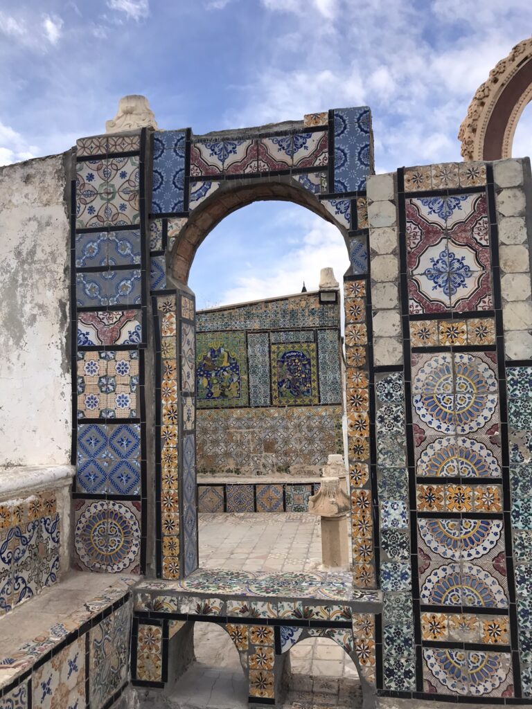 An archway with patterned tiles in Tunis