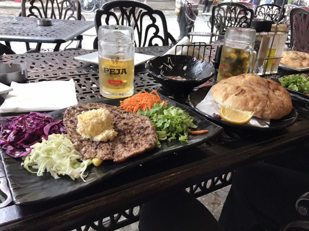 A meal of meat and bread in Prizren