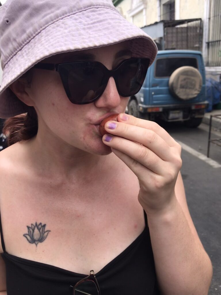 Eating fruit at the market in Santa Ana