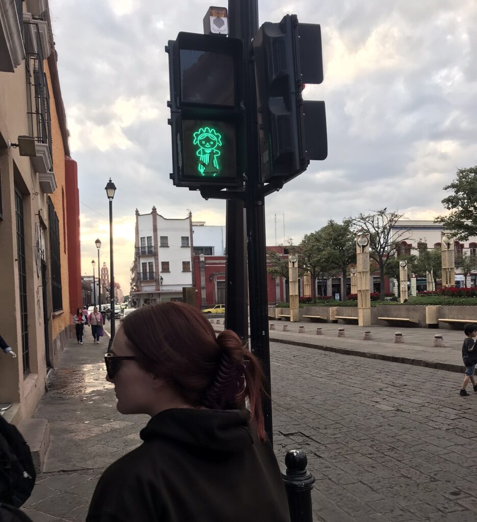 A doll symbol on a traffic light in Queretaro