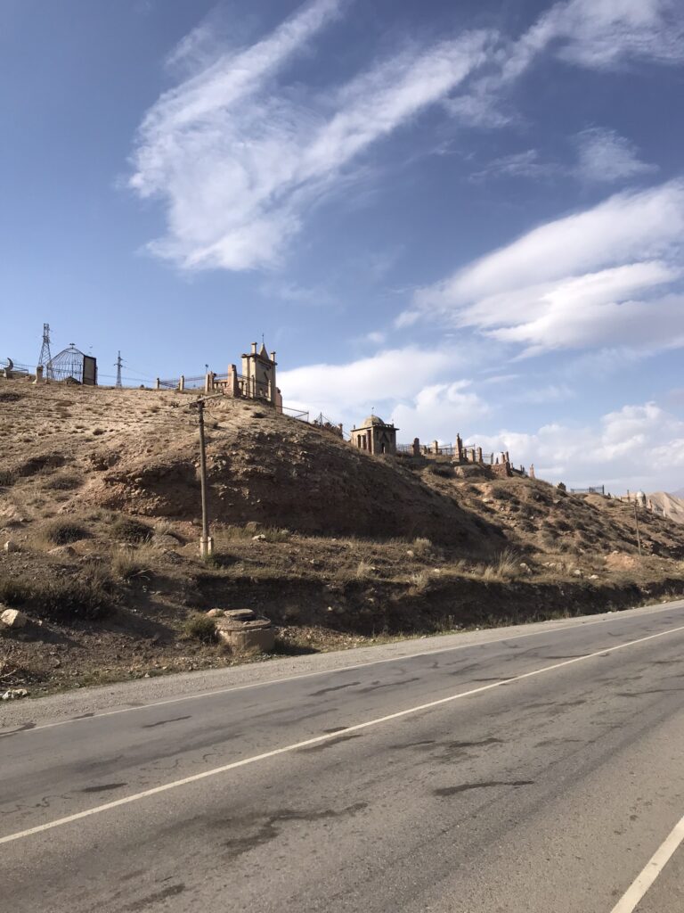 A hillside cemetery near to the city of Naryn