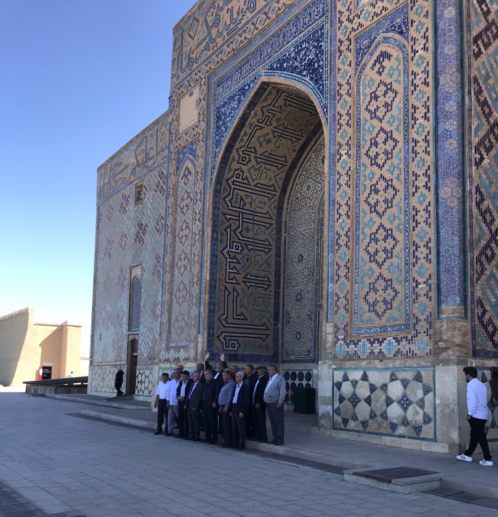 A group of men at the mausoleum in Turkistan