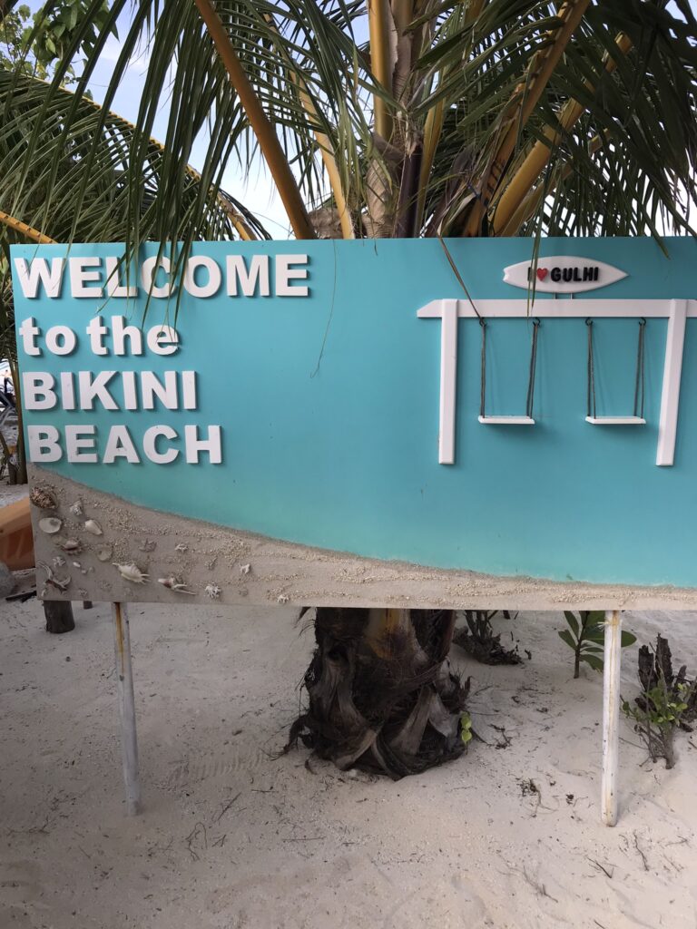 A sign for the Bikini Beach in the Maldives