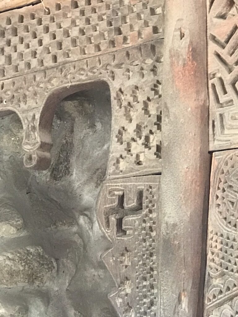A wooden carving at the mosque in Ganish