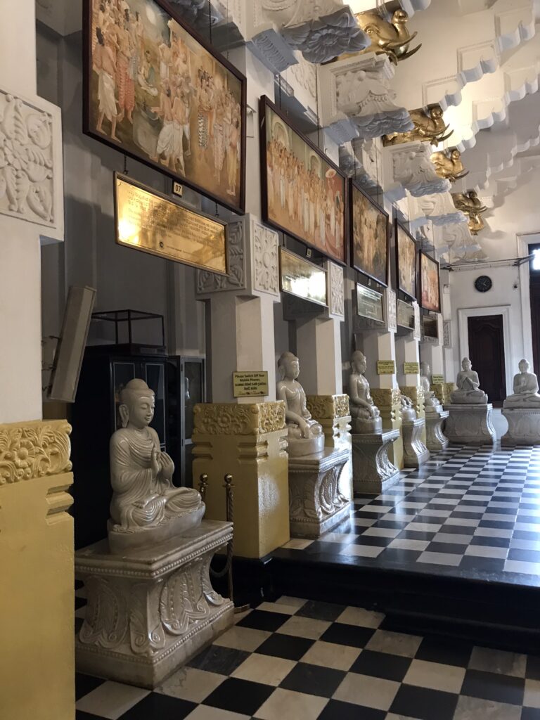 Buddhist statues in the Temple of the Sacred Tooth in Kandy