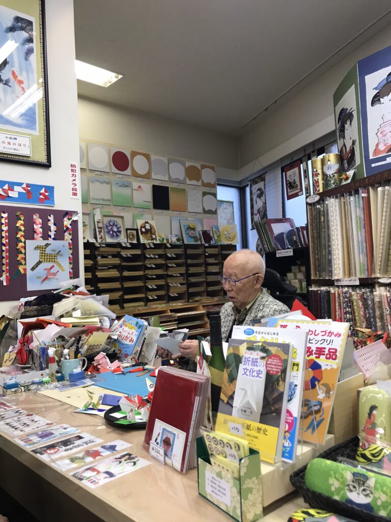 An origami master at Origami Museum in Tokyo