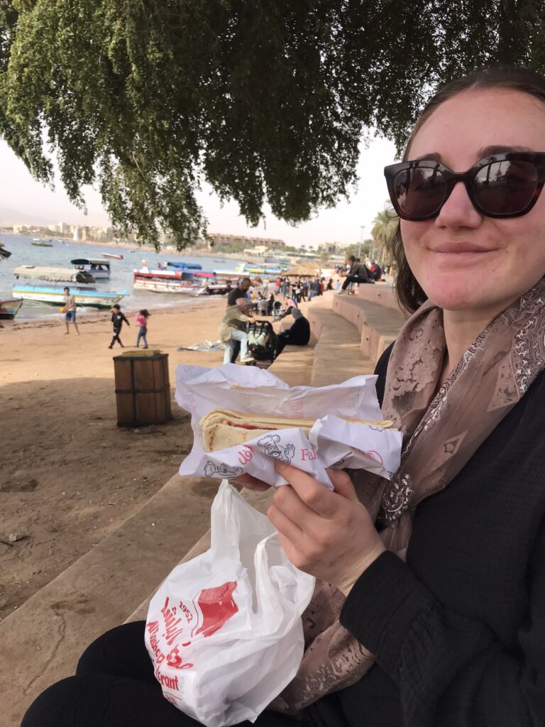 A falafel sandwich on El-ghadour beach in Aqaba