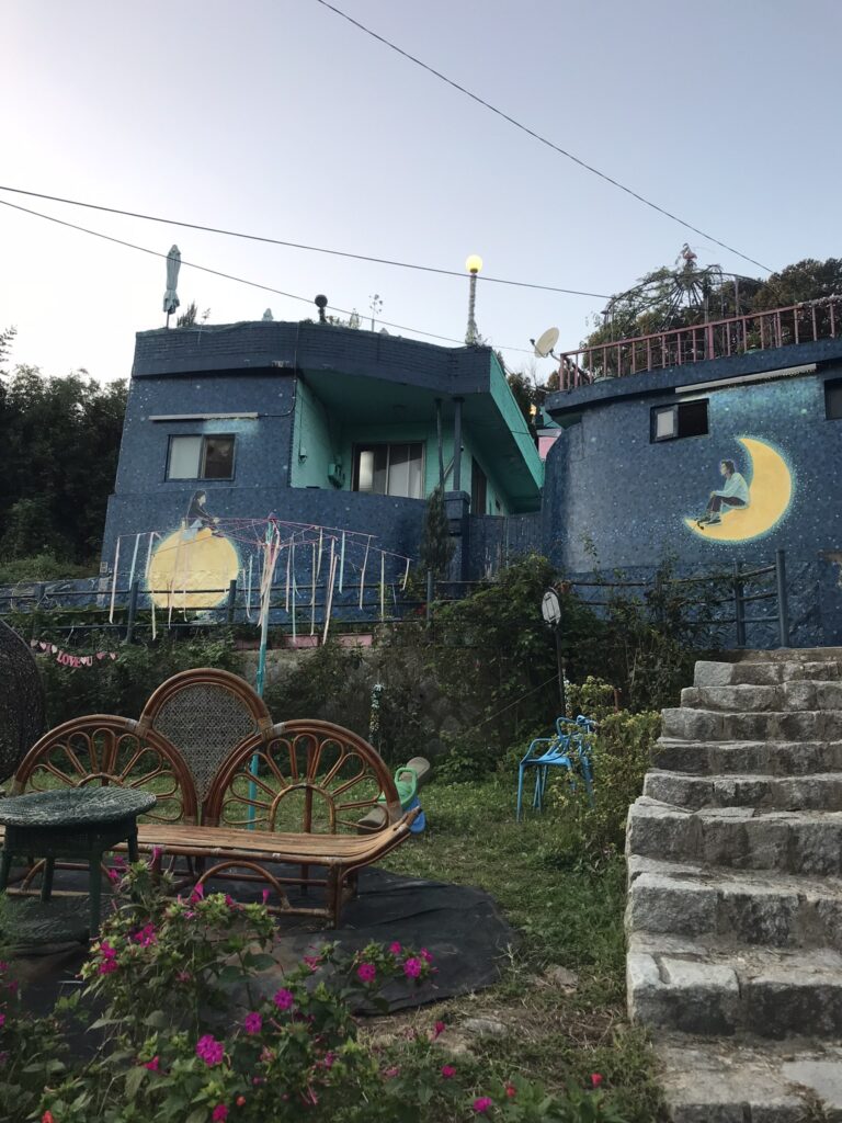 Murals on a building at Jaman Mural Village