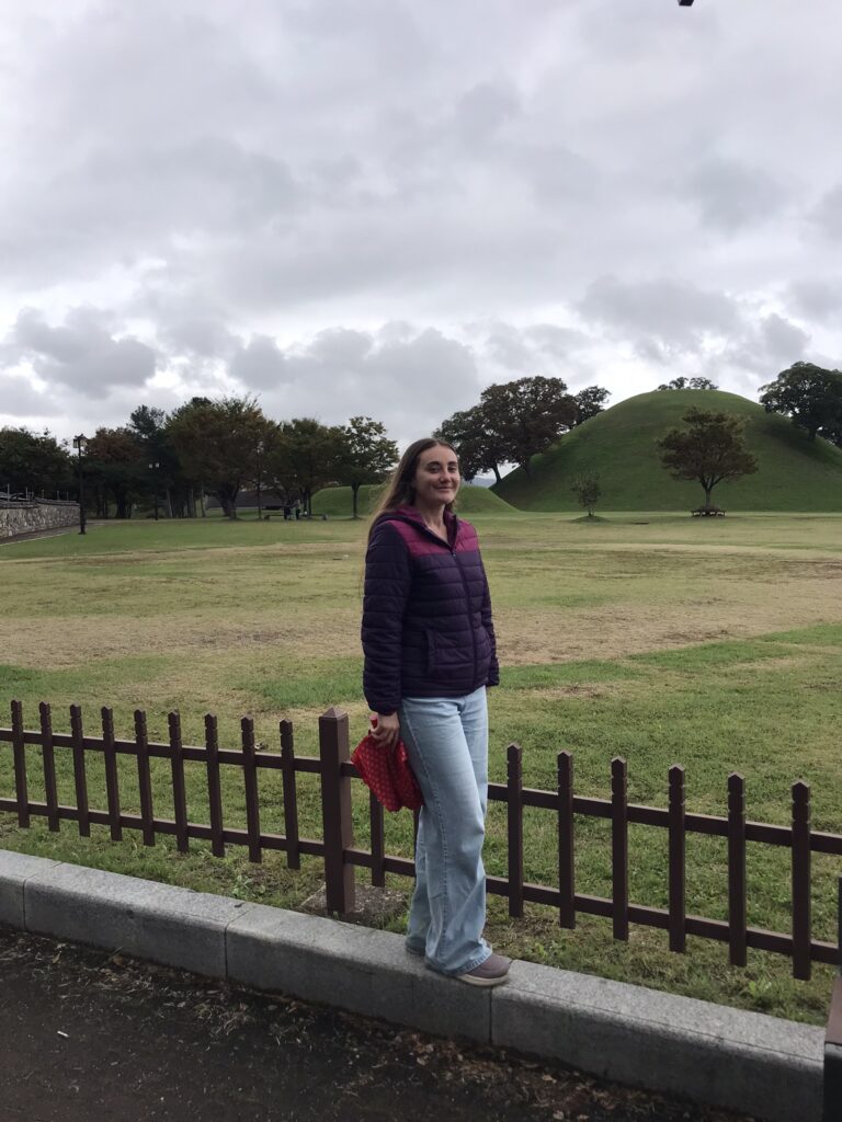 A traveler in South Korea at the Silla burial mounds in Gyeongju